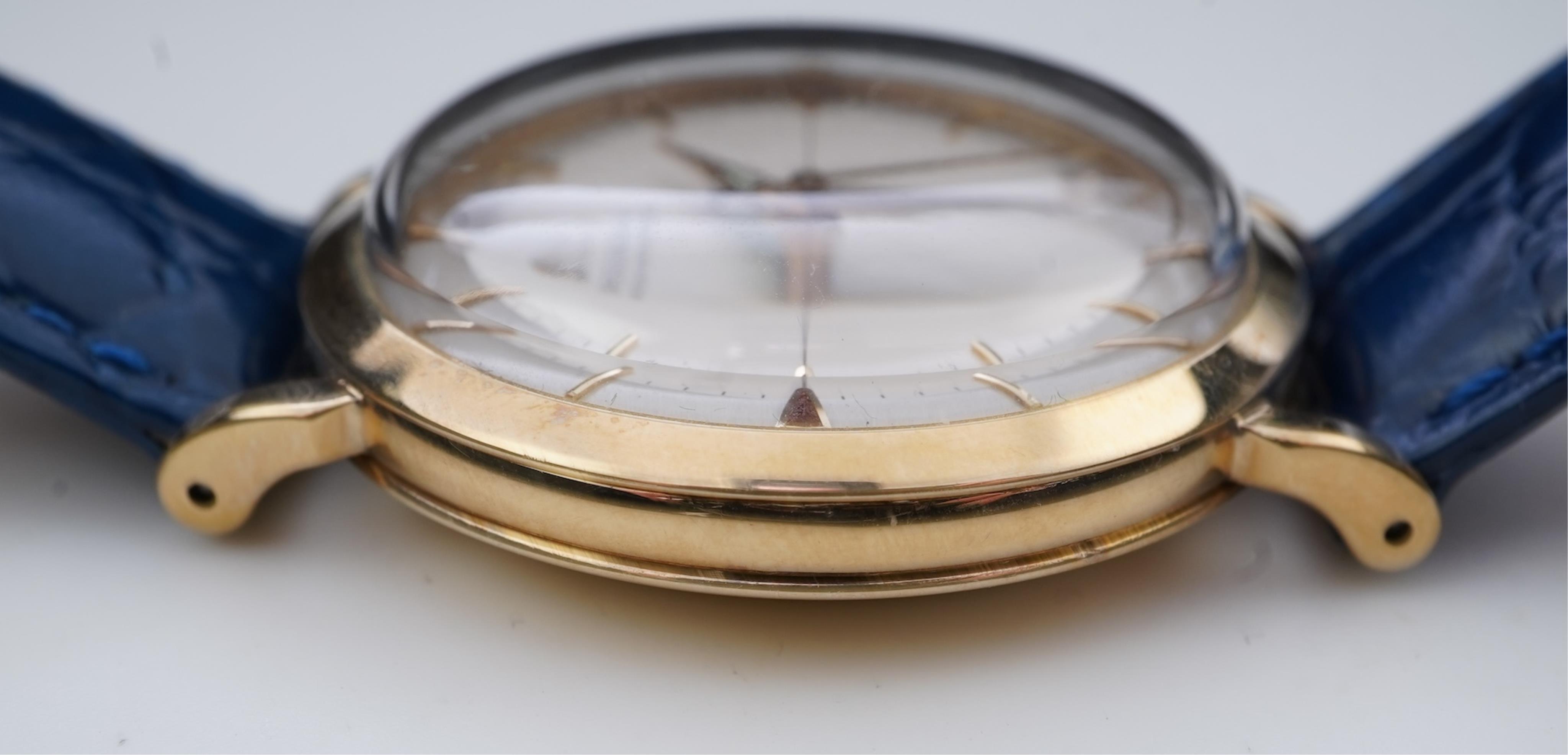 A gentleman's late 1950's 9ct gold Omega Automatic wrist watch